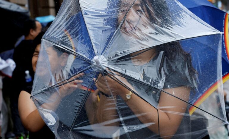 chuva-forte-atinge-pequim-durante-passagem-do-tufao-dolphin