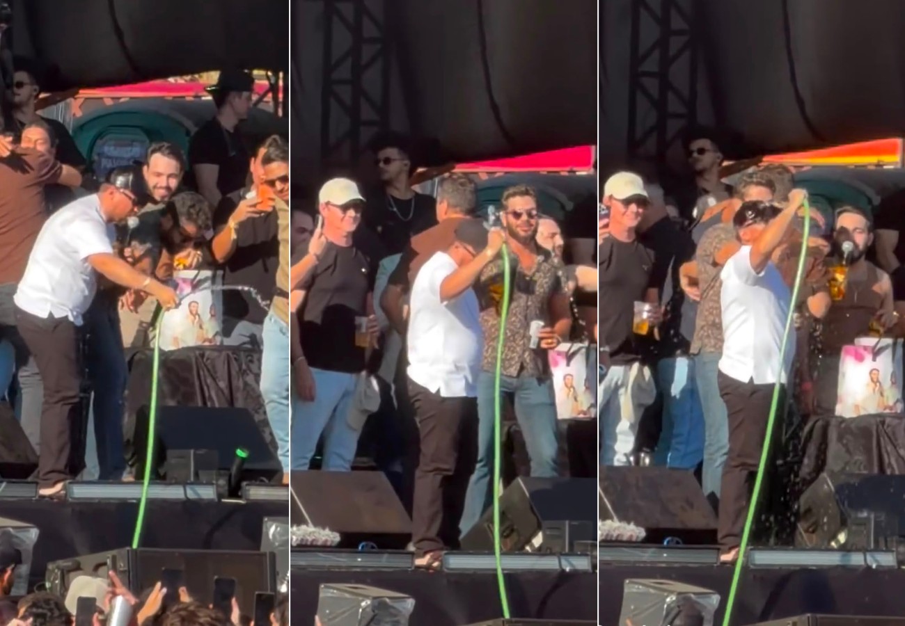 henrique-e-xand-aviao-aliviam-o-calor-com-banho-no-palco-|-g1